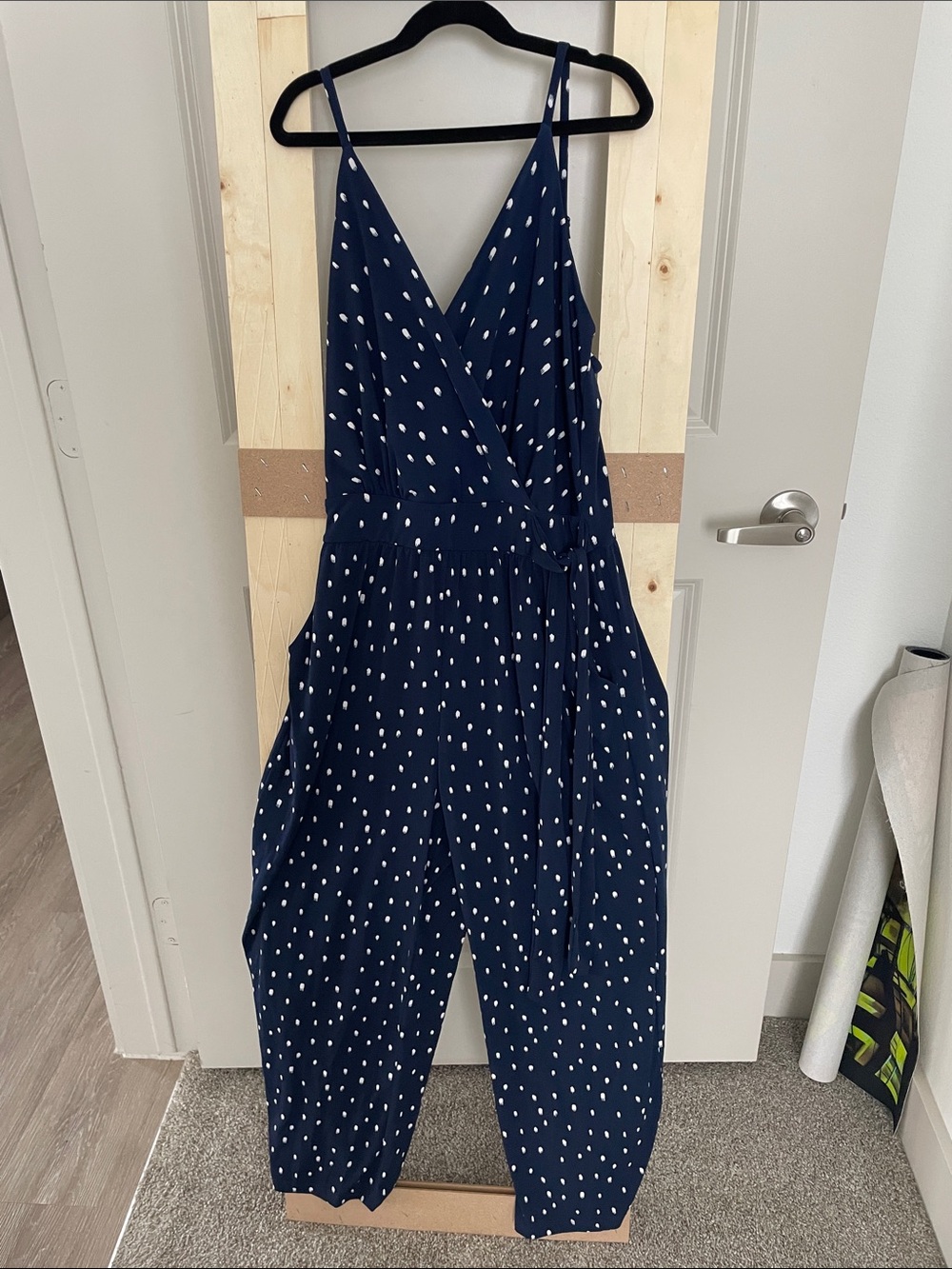 Kaileigh Navy Polka Dot Surplice Jumpsuit